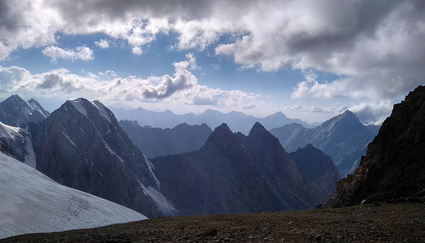 Dark mountain ridges of the Fann Mountains seen from Chimtarga pass