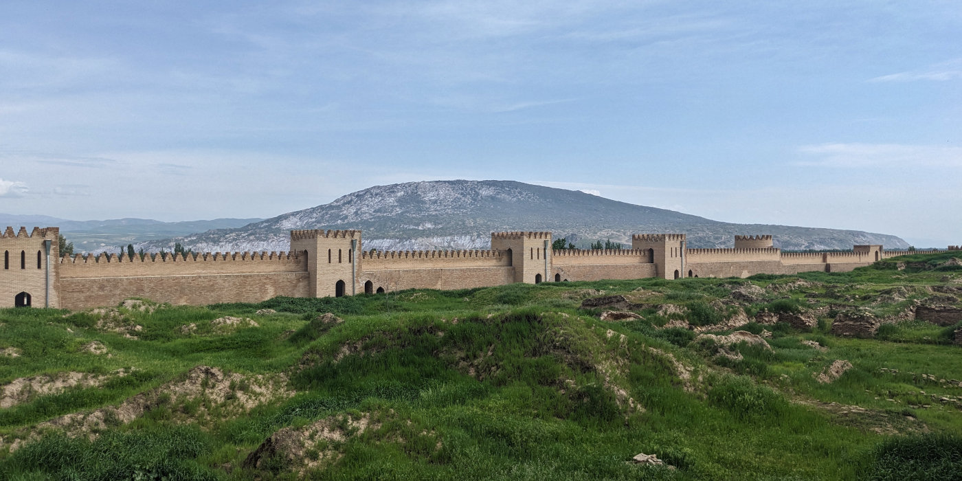 Khoja Mumin salt dome perching above the fortified wall of Hulbuk Fortress