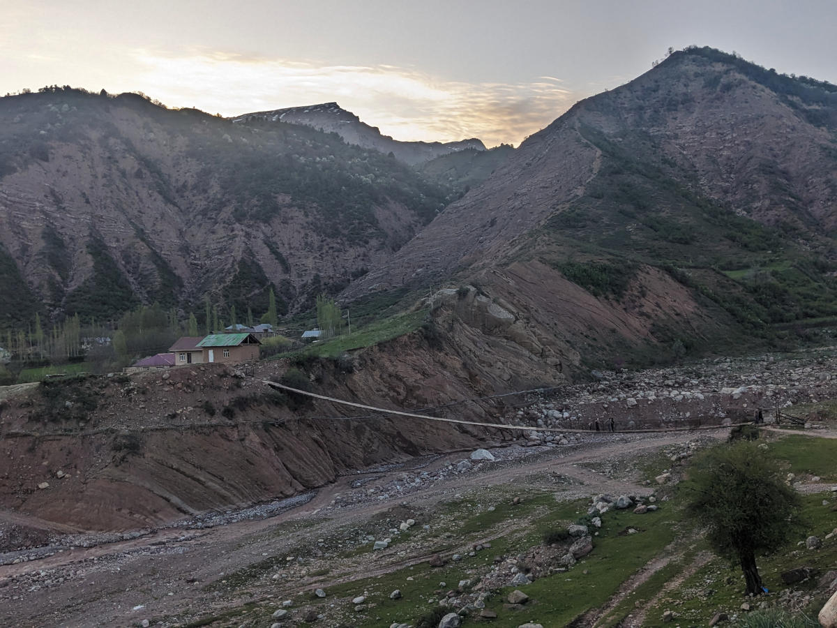 Suspension bridge across a valley at the village of Sari Khosor