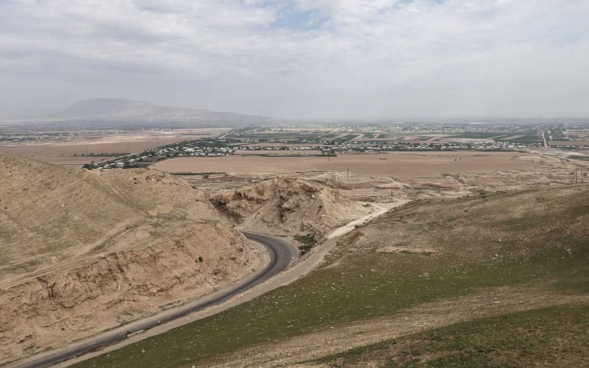 View over the Tajik depression with villages on a vast plane