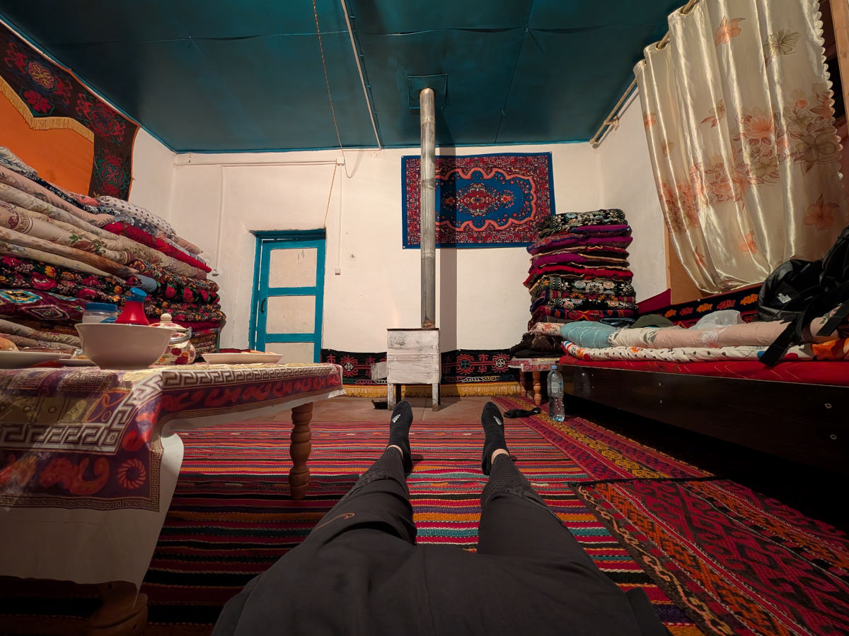 Inside view of a homestay in Karakul village with lots of bright colors