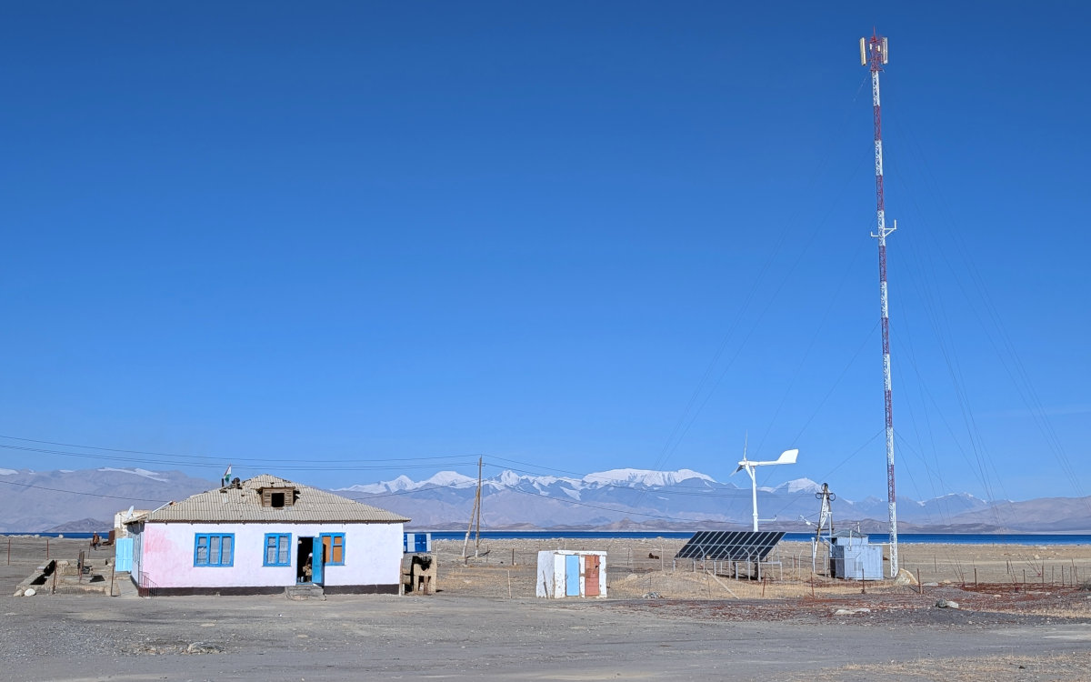 Weather station in Karakul village with Karakul Lake in the background