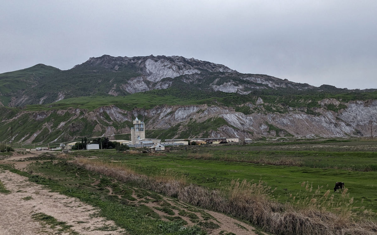 Dome of the Khoja Mumin salt mine with the main processing plant in front of it